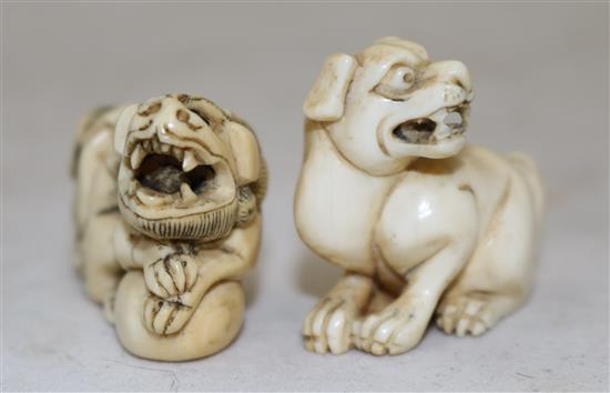 Two Japanese ivory netsuke of a shi-shi and a hound, 19th century, 3.9cm and 3.4cm